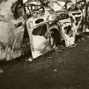 Regjeringens buss bombet i stykker ved Nybergsund 11. april 1940. Foto: Johan Wilhelm Clüver, De kongelige samlinger